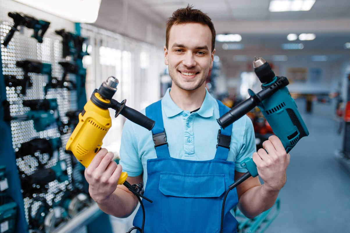 Hardware Man Holding Power Tools